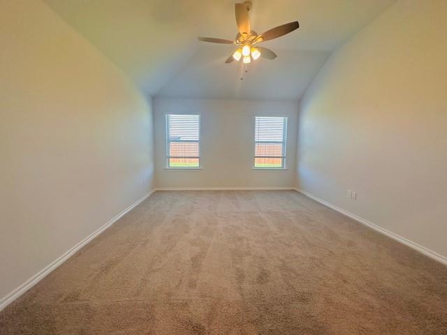 3428 North Crowley Cleburne Road Fort Worth, TX 76123 - Photo 5 of 11 an empty room with windows and fan