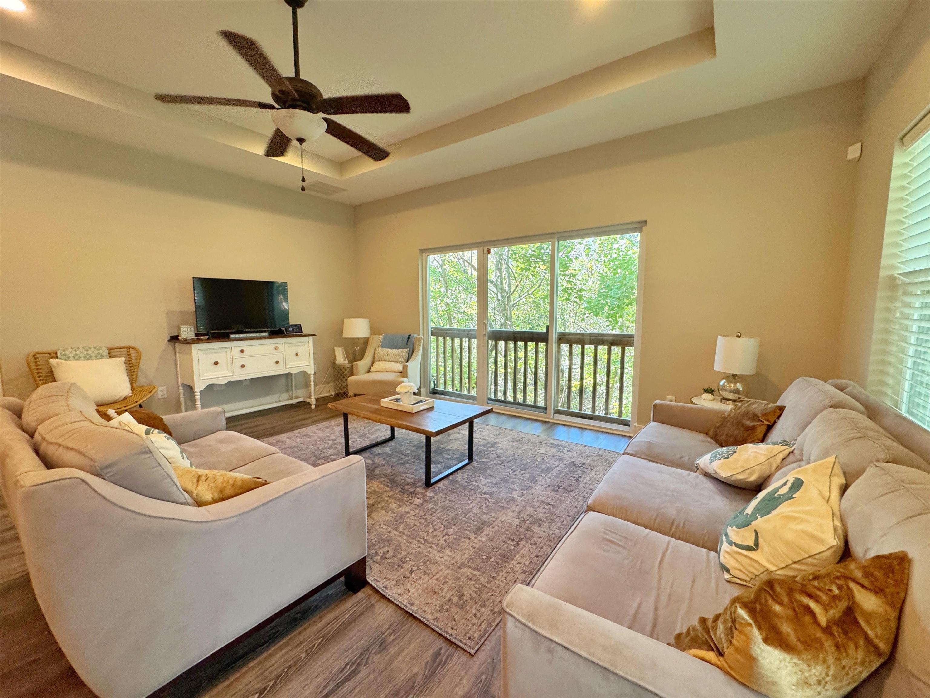 2523 Oleander Street St. Augustine, FL 32080 - Photo 24 of 54 a living room with furniture and a flat screen tv