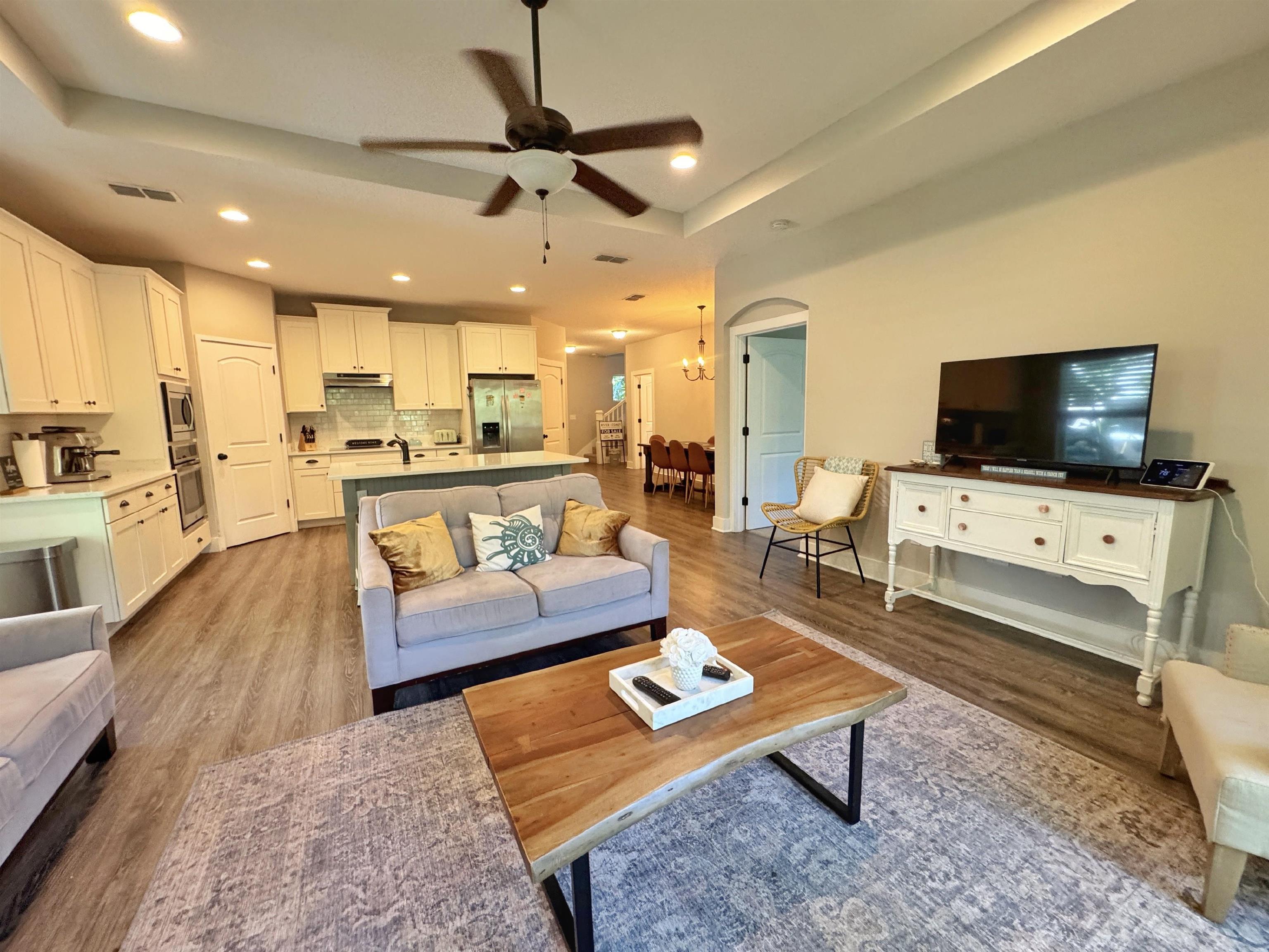 2523 Oleander Street St. Augustine, FL 32080 - Photo 27 of 54 a living room with furniture and a flat screen tv