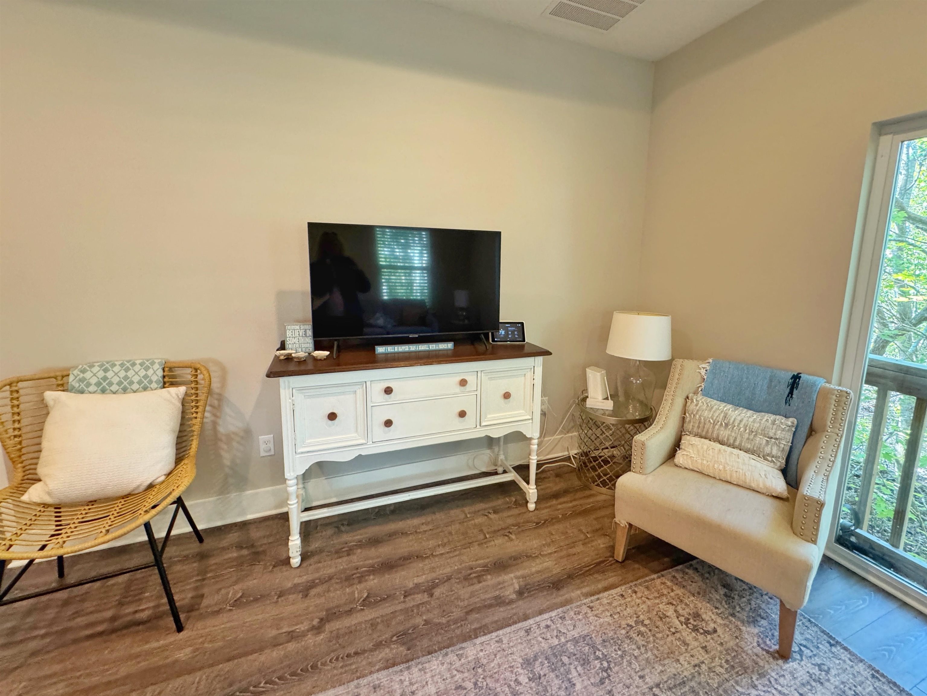 2523 Oleander Street St. Augustine, FL 32080 - Photo 28 of 54 a living room with furniture and a flat screen tv