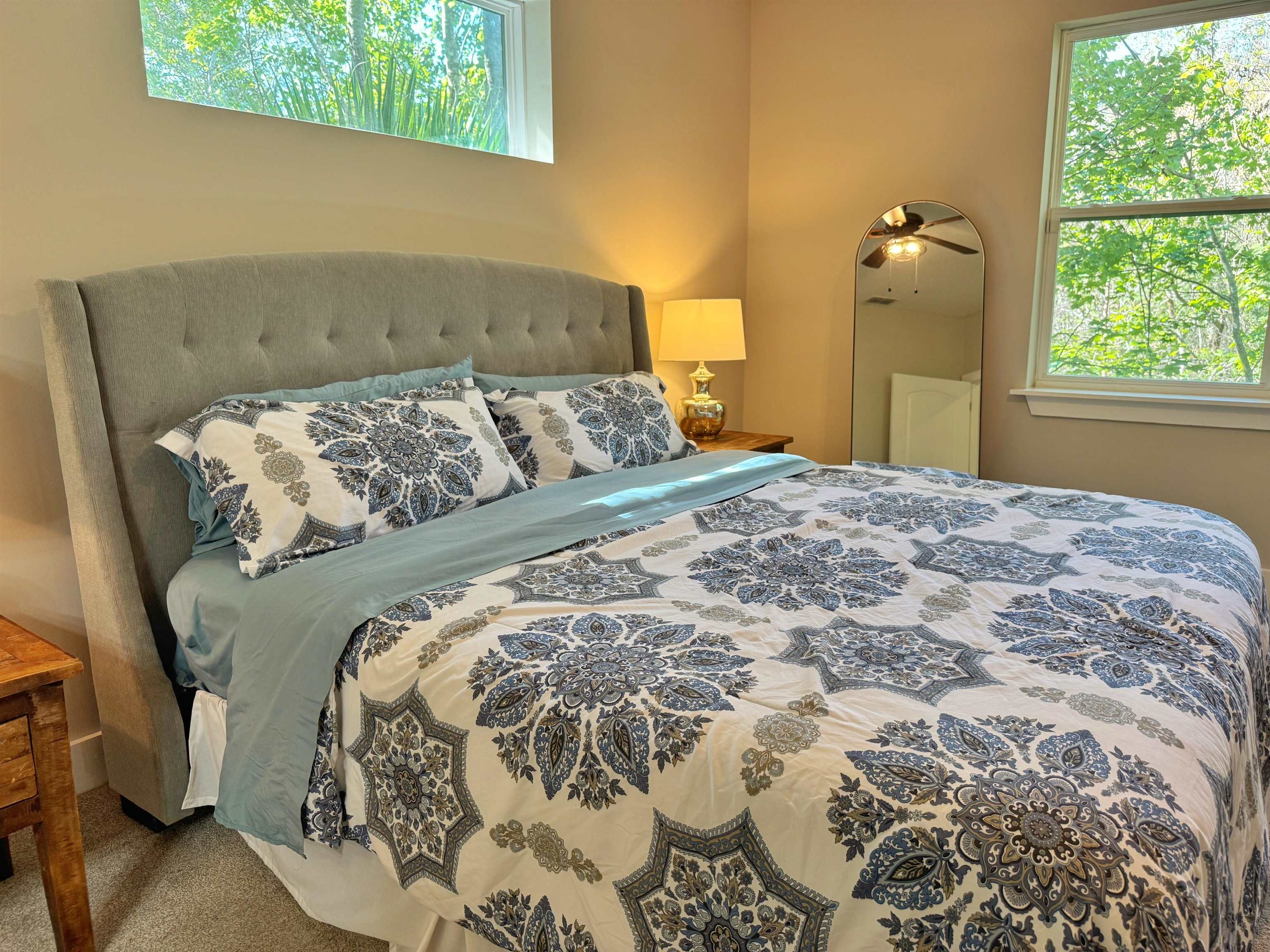 2523 Oleander Street St. Augustine, FL 32080 - Photo 33 of 54 a bed sitting in a bedroom next to a window