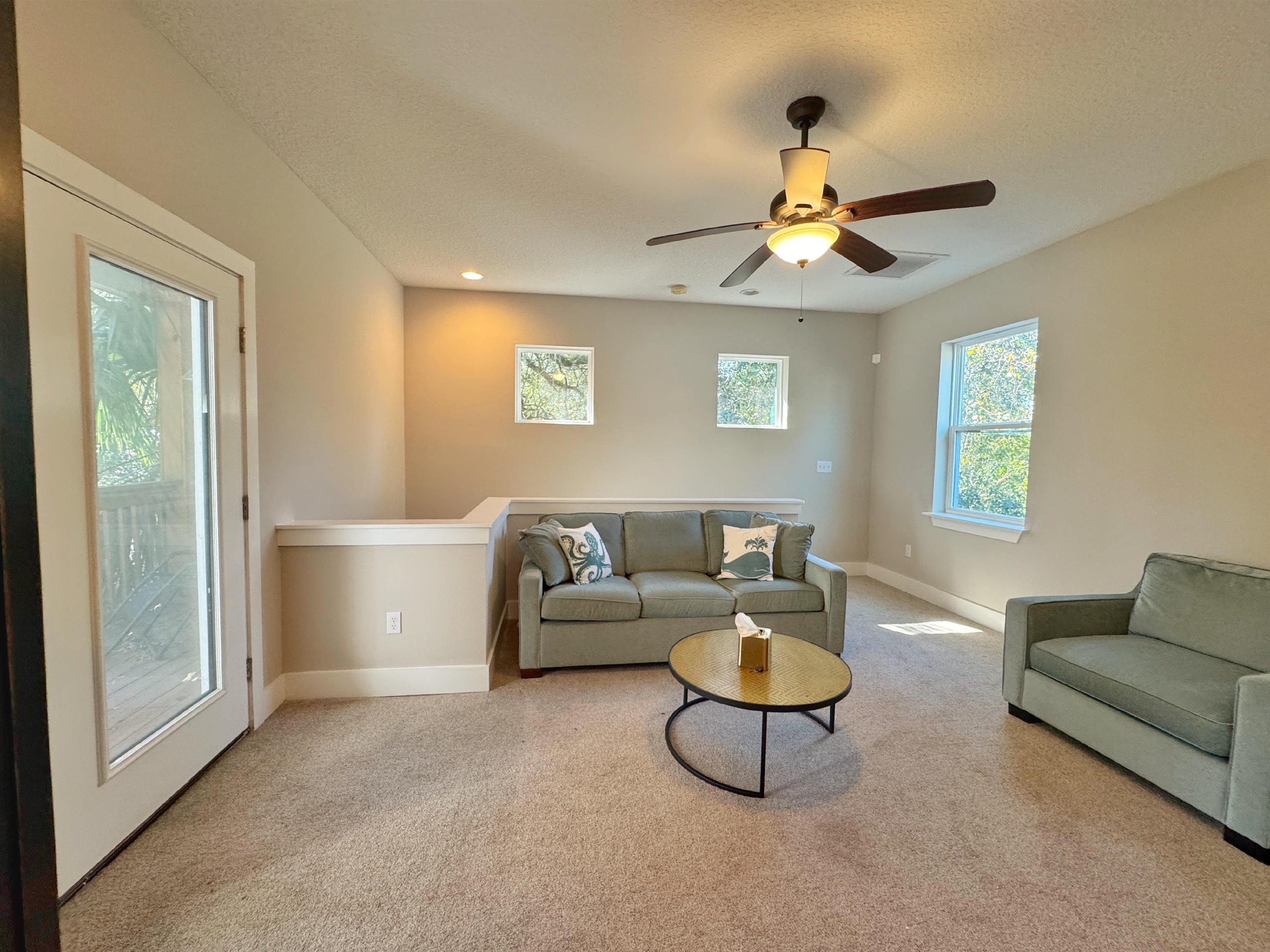 2523 Oleander Street St. Augustine, FL 32080 - Photo 40 of 54 a living room with furniture and a window