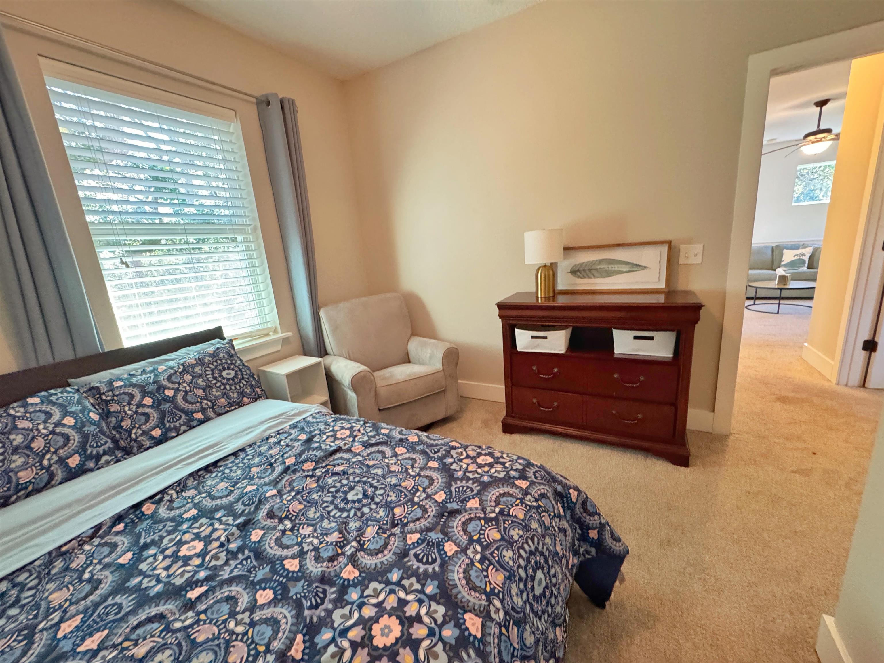 2523 Oleander Street St. Augustine, FL 32080 - Photo 44 of 54 a bedroom with a bed and wooden floor