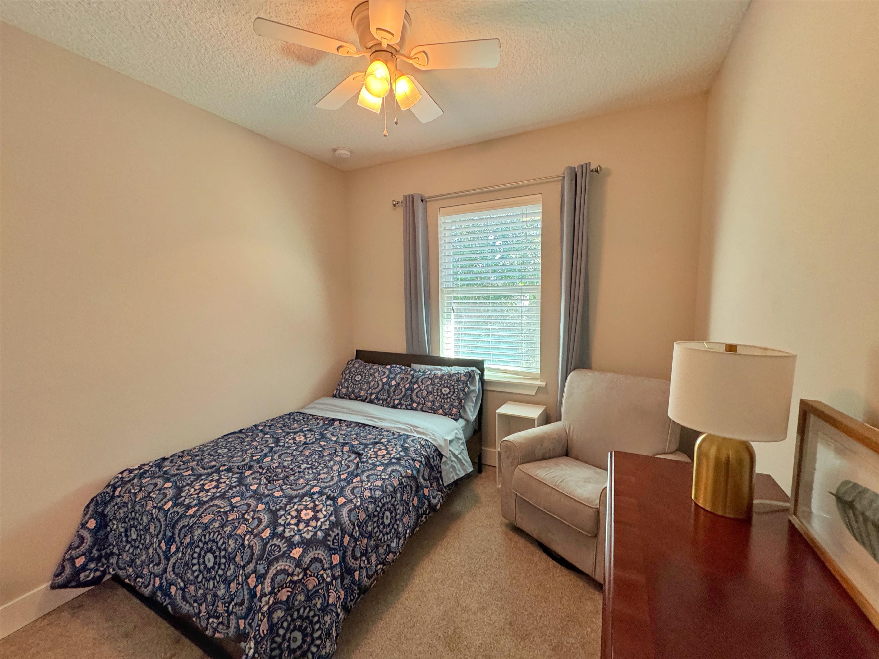 2523 Oleander Street St. Augustine, FL 32080 - Photo 49 of 54 a bedroom with a bed and wooden floor