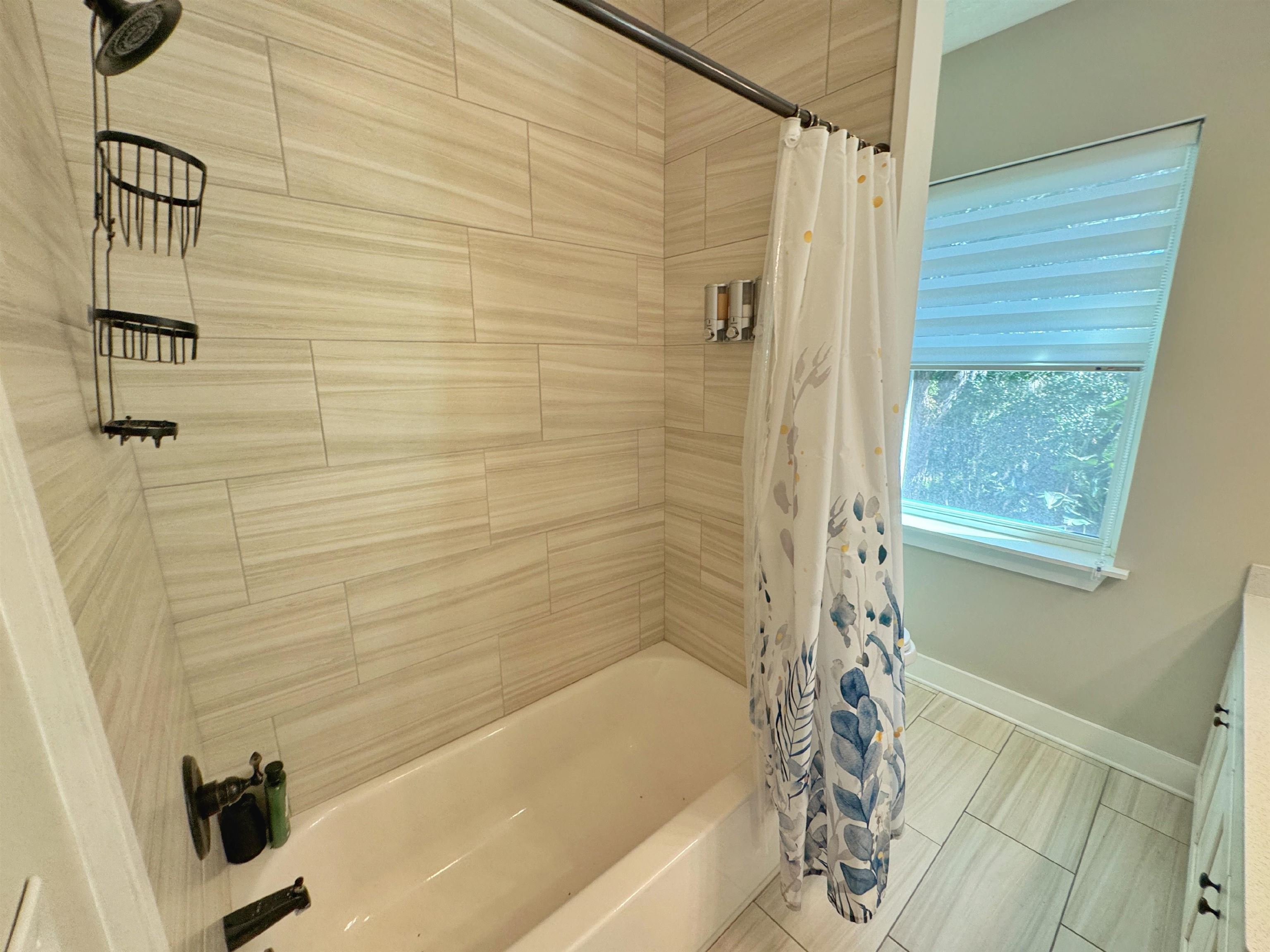 2523 Oleander Street St. Augustine, FL 32080 - Photo 50 of 54 a bathroom with a bathtub and shower