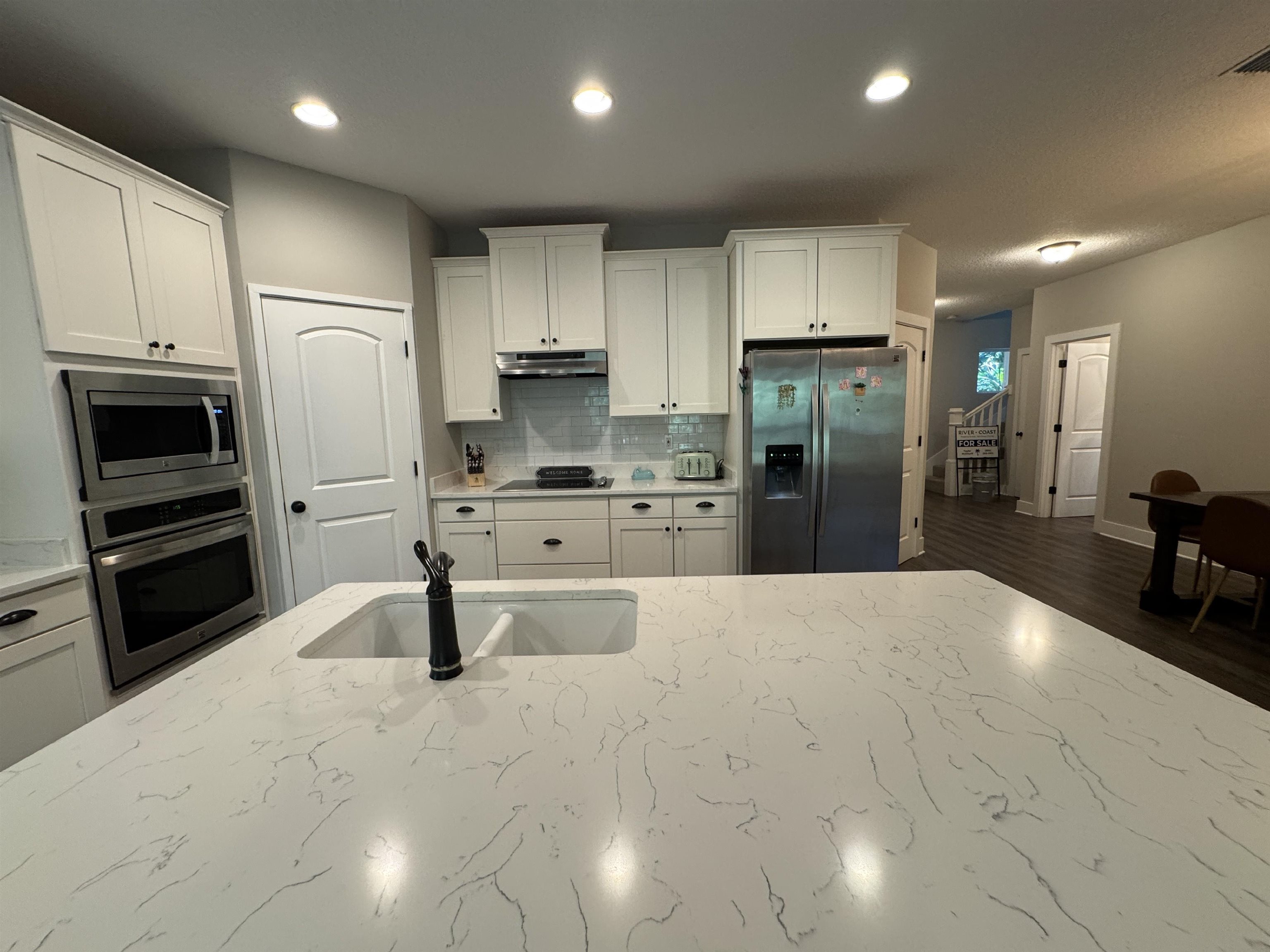 2523 Oleander Street St. Augustine, FL 32080 - Photo 10 of 54 a large kitchen with stainless steel appliances a refrigerator a stove and a sink