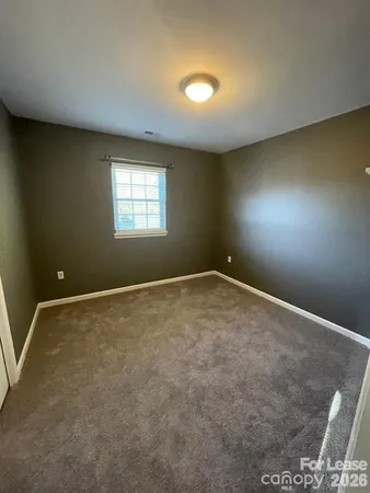 an empty room with a natural light