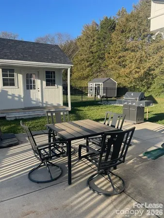 a view of a dinning table and chair in the house