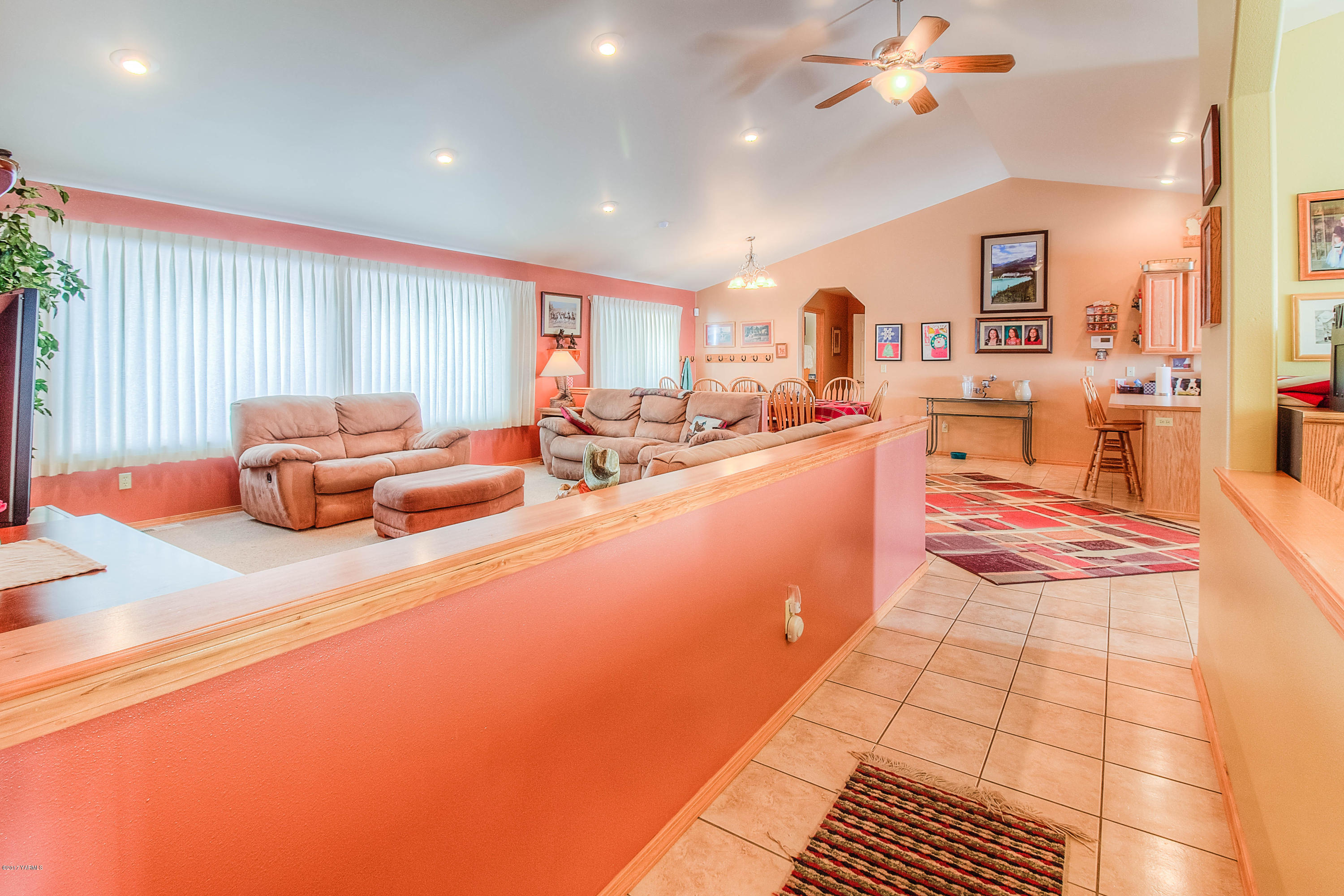 205 Beane Road Moxee, WA 98936 - Photo 5 of 28 a living room with furniture and a flat screen tv