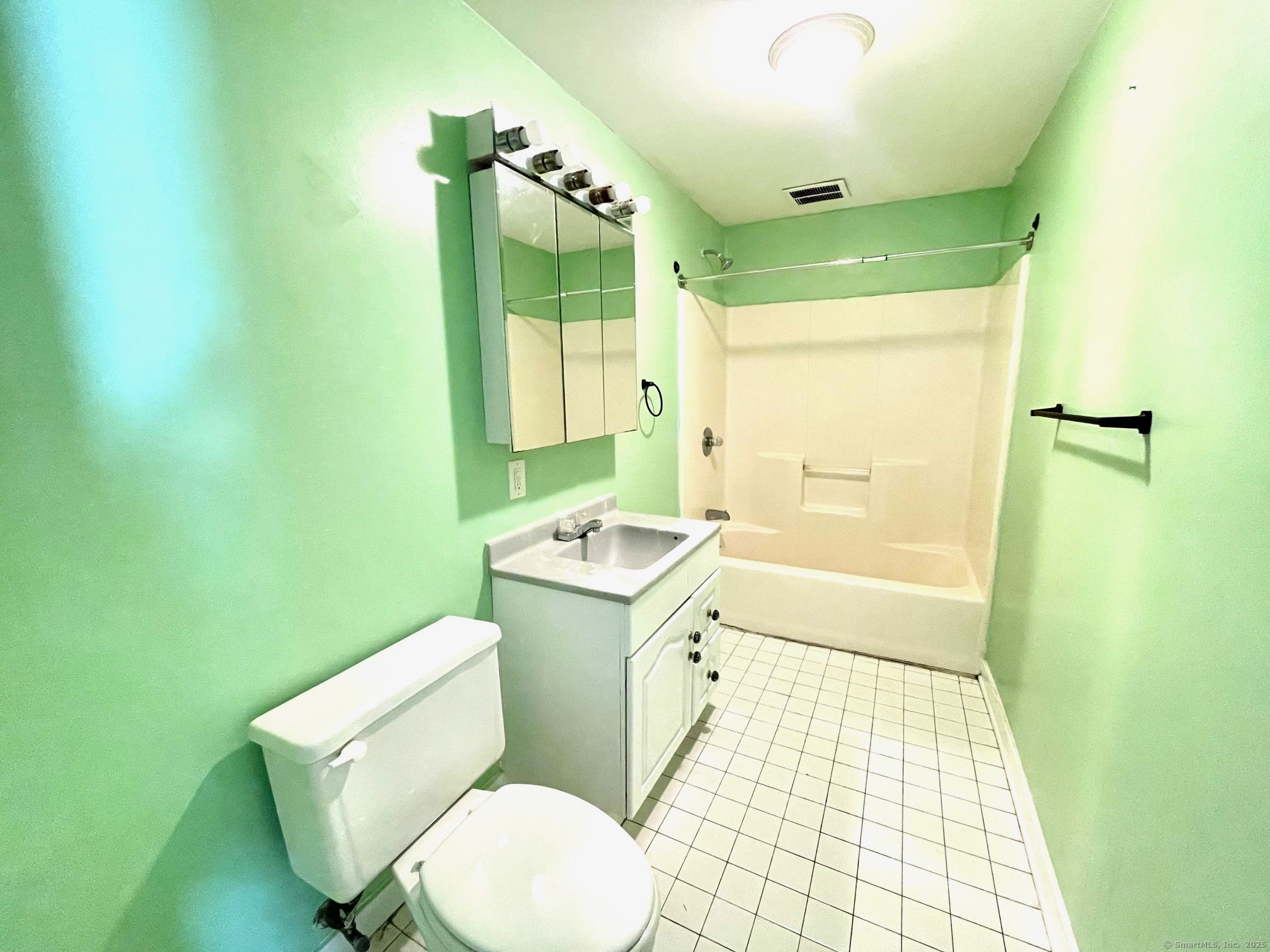 21 Elm Street Ansonia, CT 06401 - Photo 15 of 17 a bathroom with a sink toilet and shower