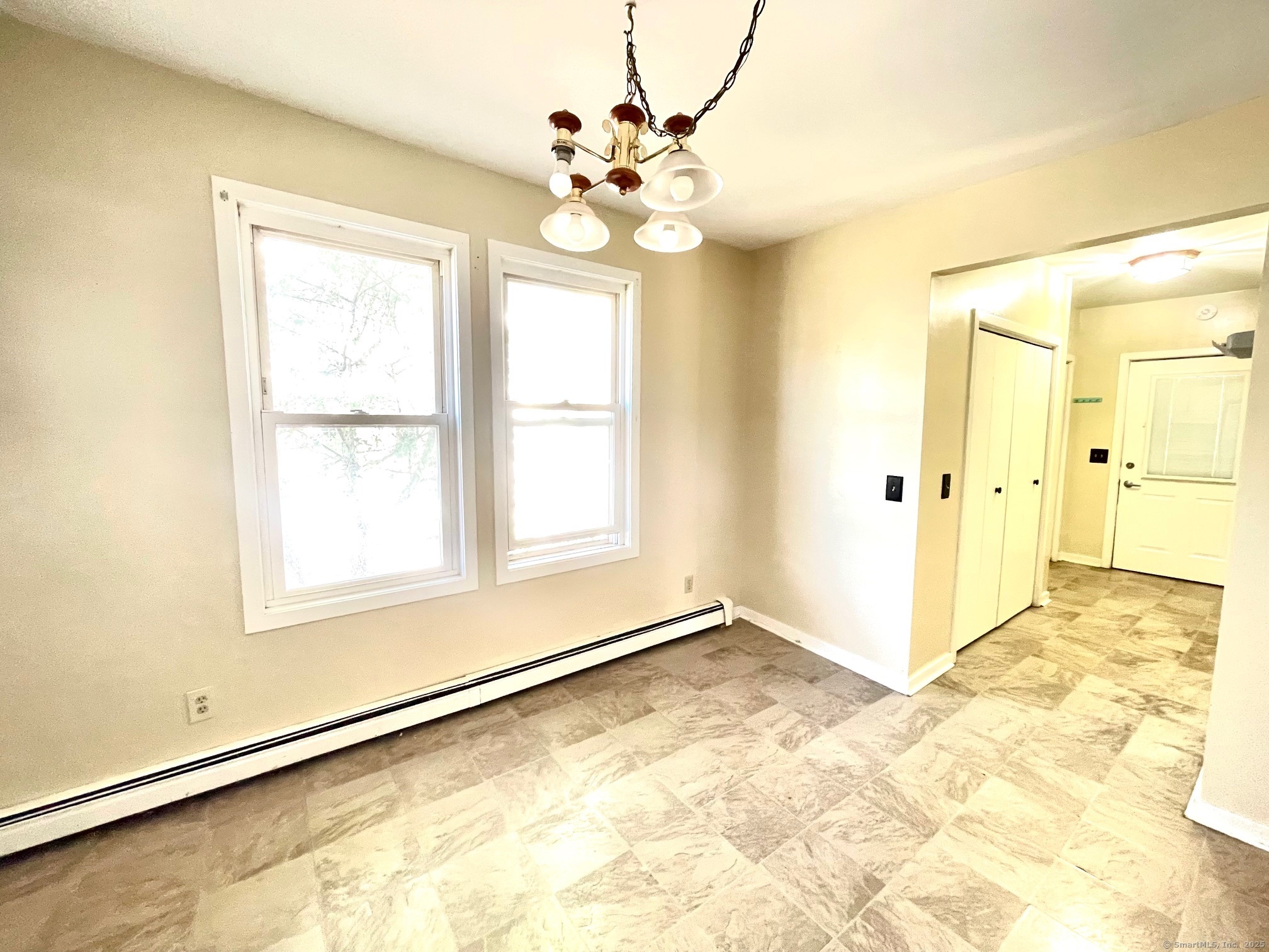 21 Elm Street Ansonia, CT 06401 - Photo 6 of 17 en view of an empty room with a window