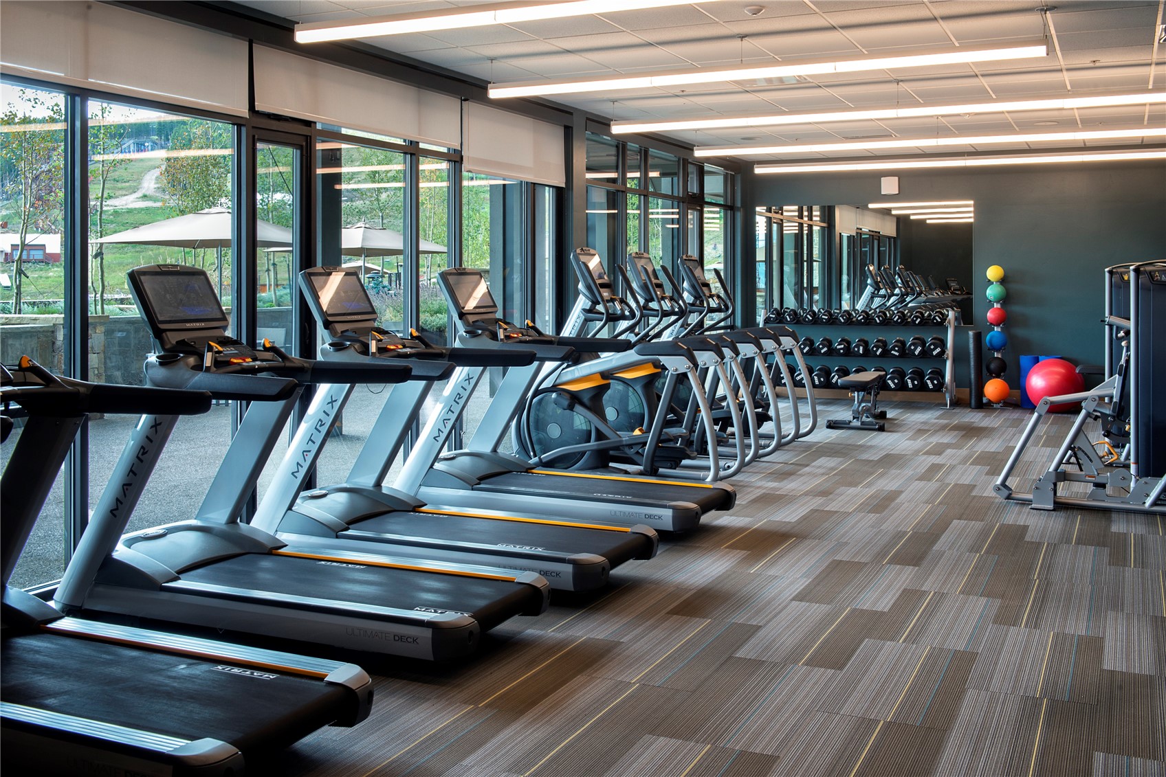 1627 Ski Hill Road, Unit COLORADO Breckenridge, CO 80424 - Photo 6 of 7 a view of gym equipment with wooden floor