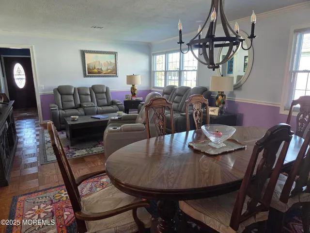 a view of a dining room with furniture
