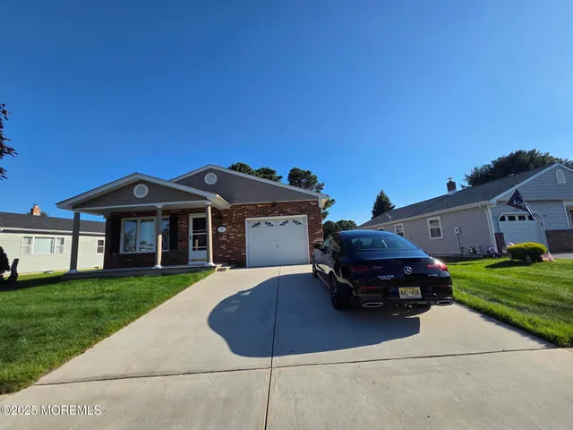 a house view with a garden space