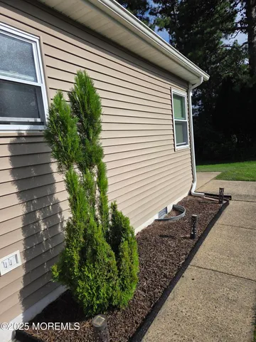 a kitchen with a dining table and chairs