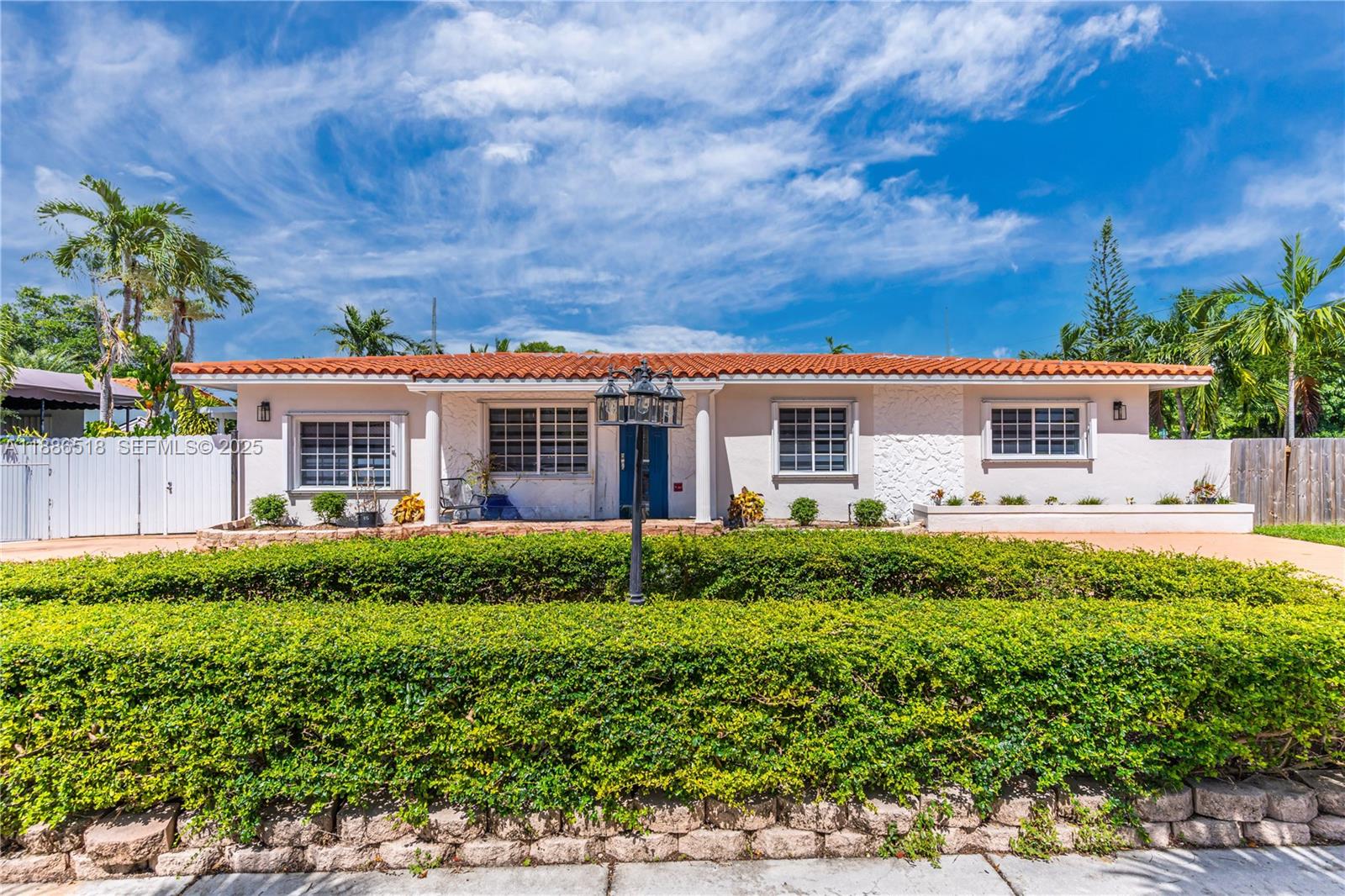 a view of a house with a garden