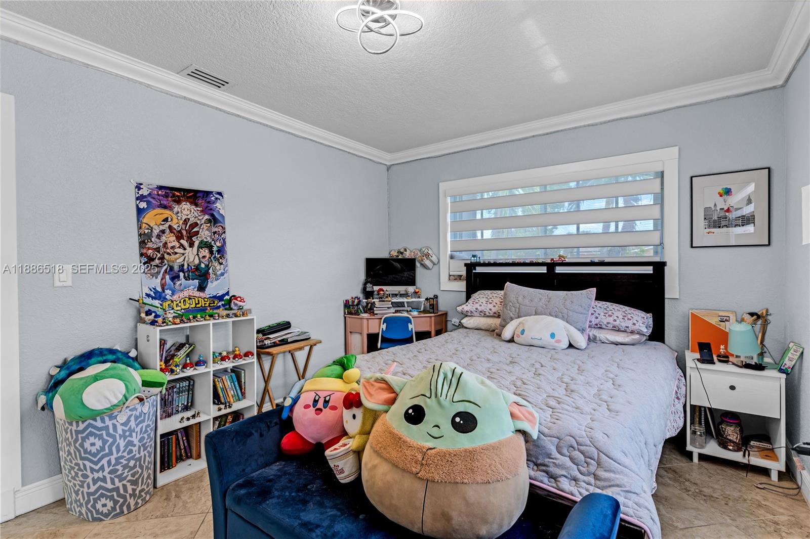 9901 Southwest 35th Terrace Miami, FL 33165 - Photo 39 of 39 a bedroom with bed and a window