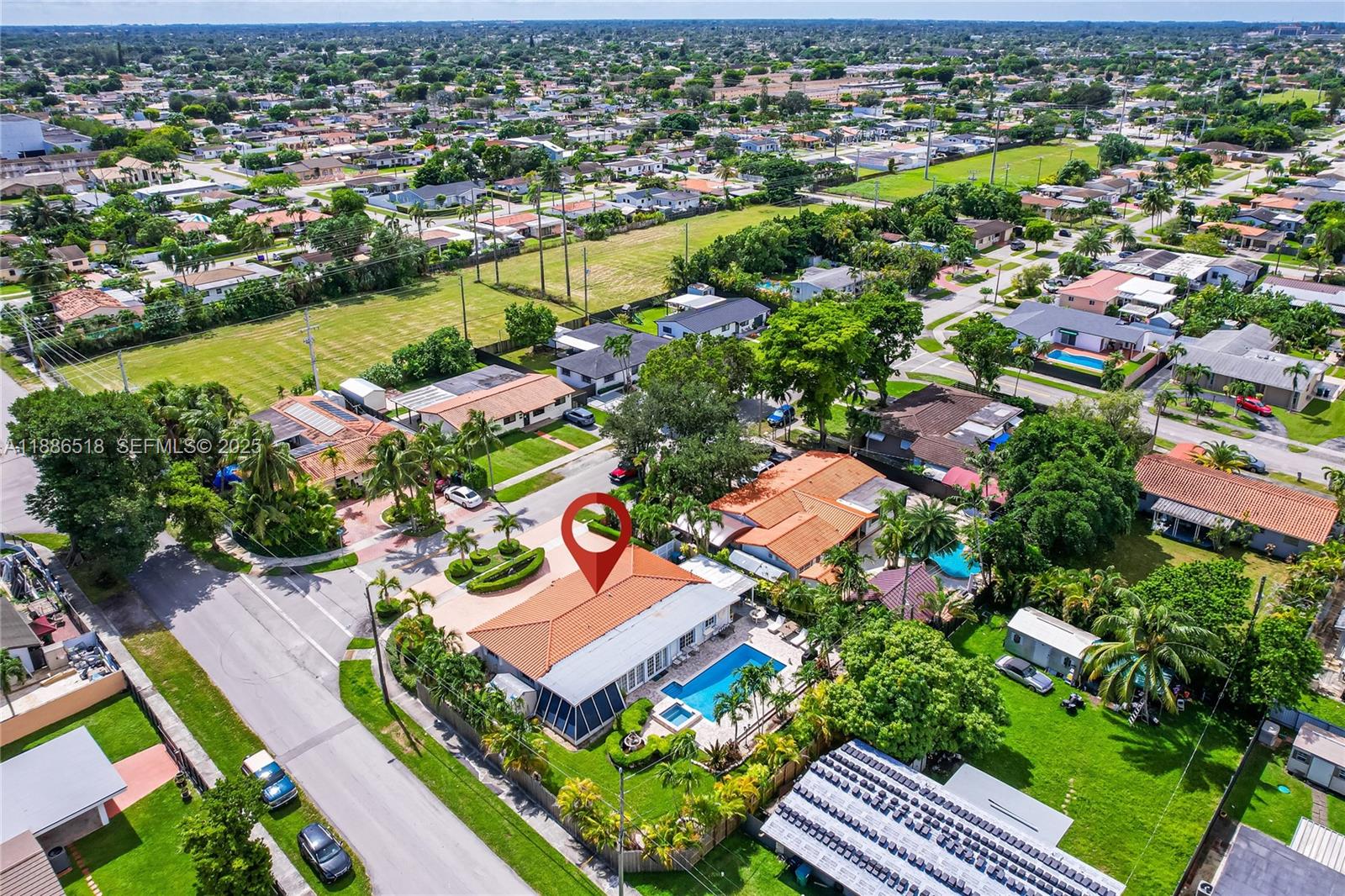 9901 Southwest 35th Terrace Miami, FL 33165 - Photo 5 of 39 an aerial view of residential houses with outdoor space and swimming pool