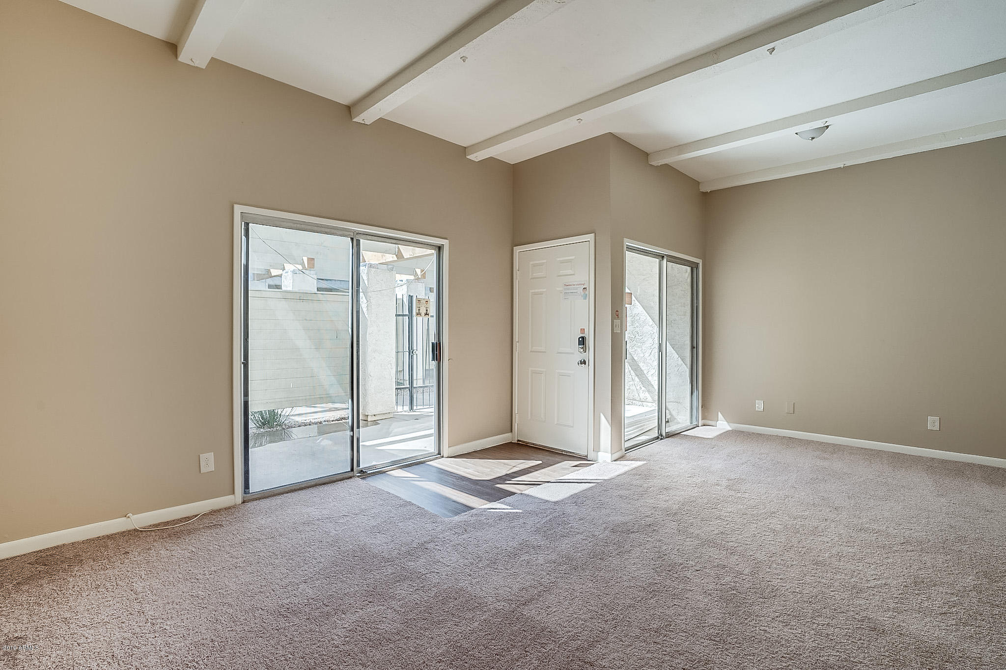 516 South Evergreen Road Tempe, AZ 85288 - Photo 3 of 16 an empty room with closet and bathroom