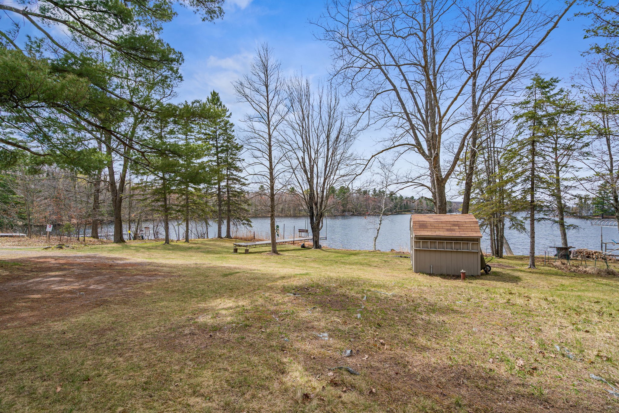 12503 Small Road Hayward, WI 54843 - Photo 11 of 36 Newer shed for lake toys, rafts, and vests for easy access to the lake.