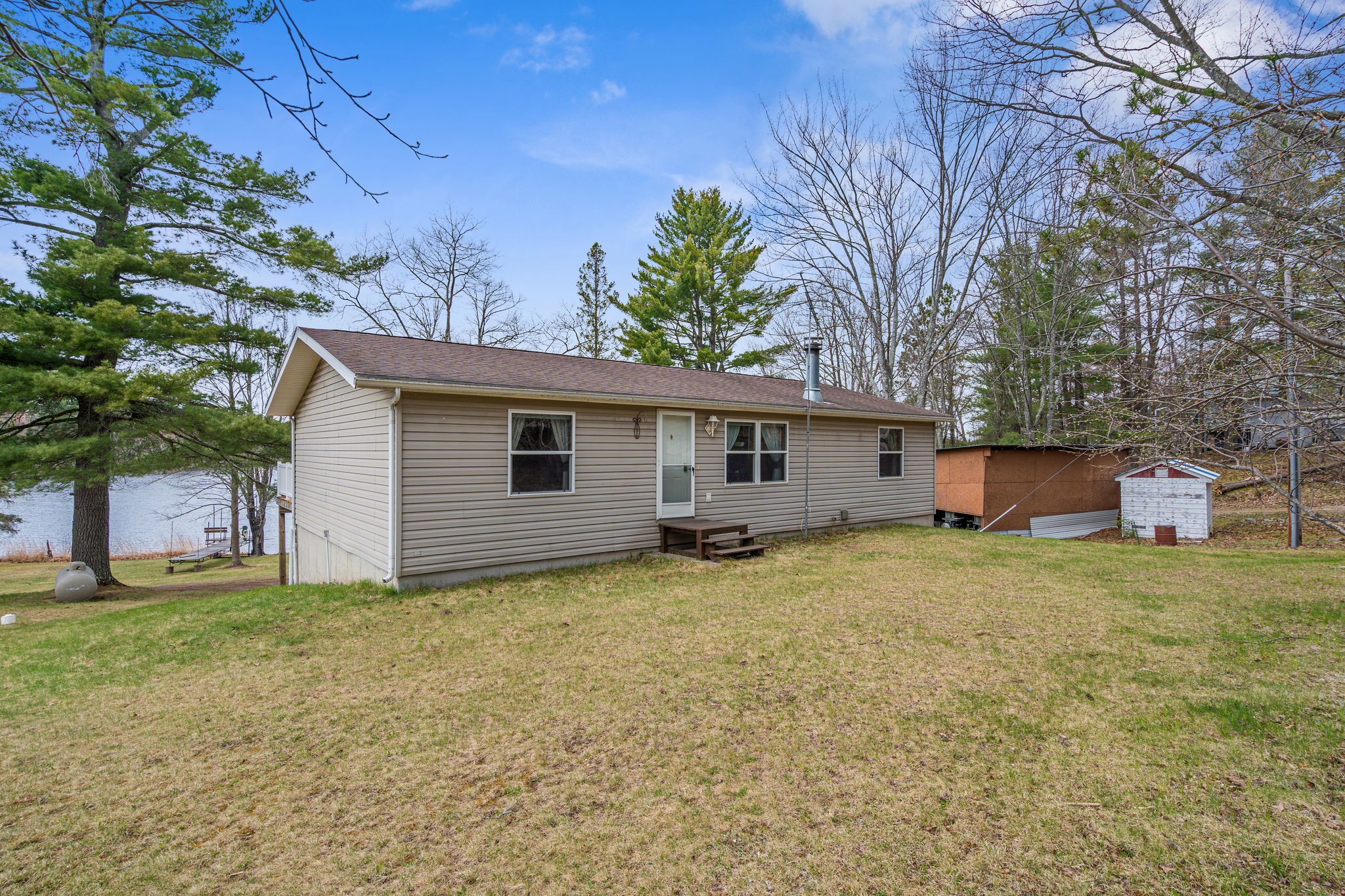12503 Small Road Hayward, WI 54843 - Photo 16 of 36 Gentle slope for those who prefer to enter from the back door.