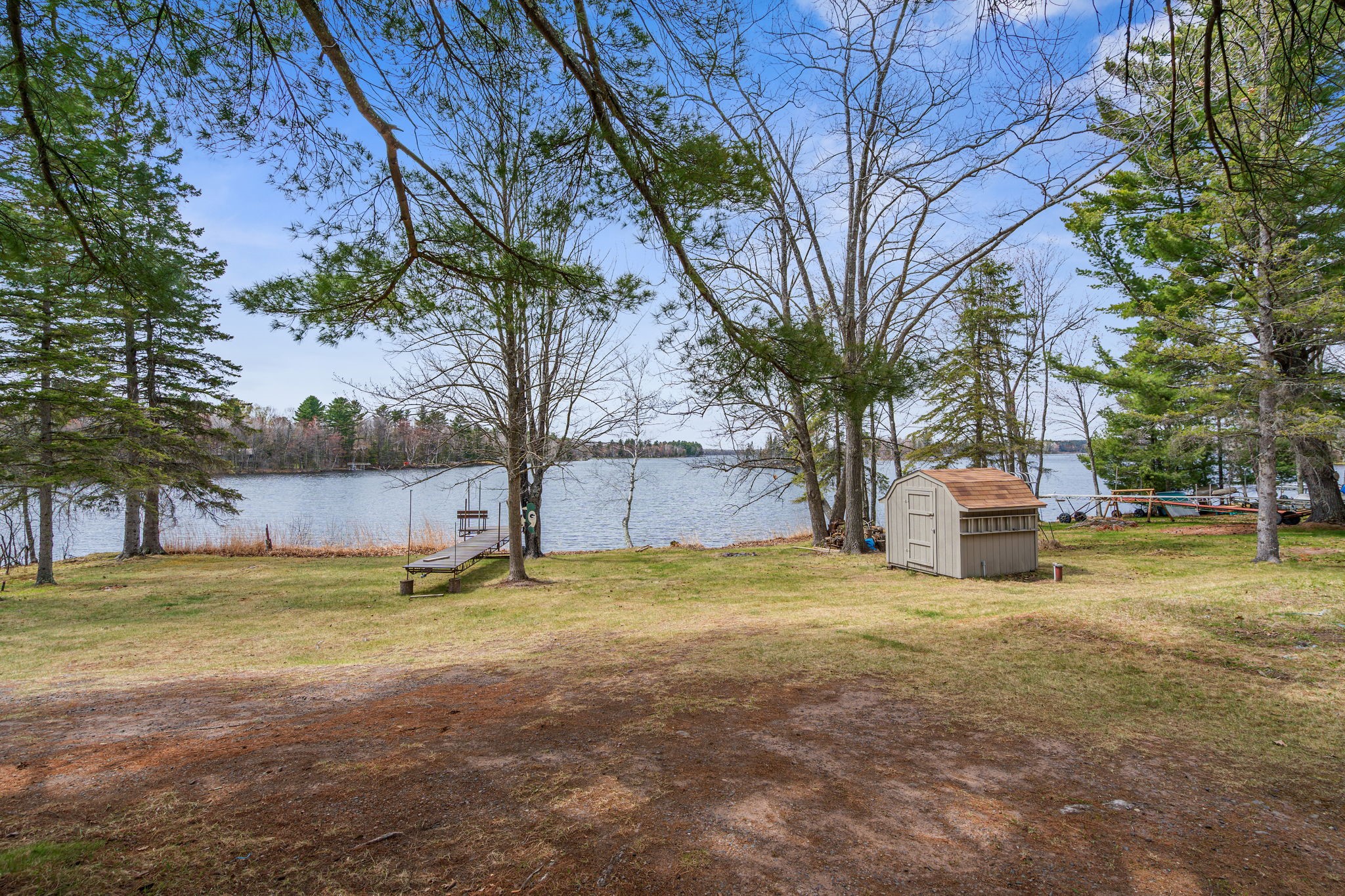 12503 Small Road Hayward, WI 54843 - Photo 2 of 36 100 ft of lakefront with low elevation to the water.