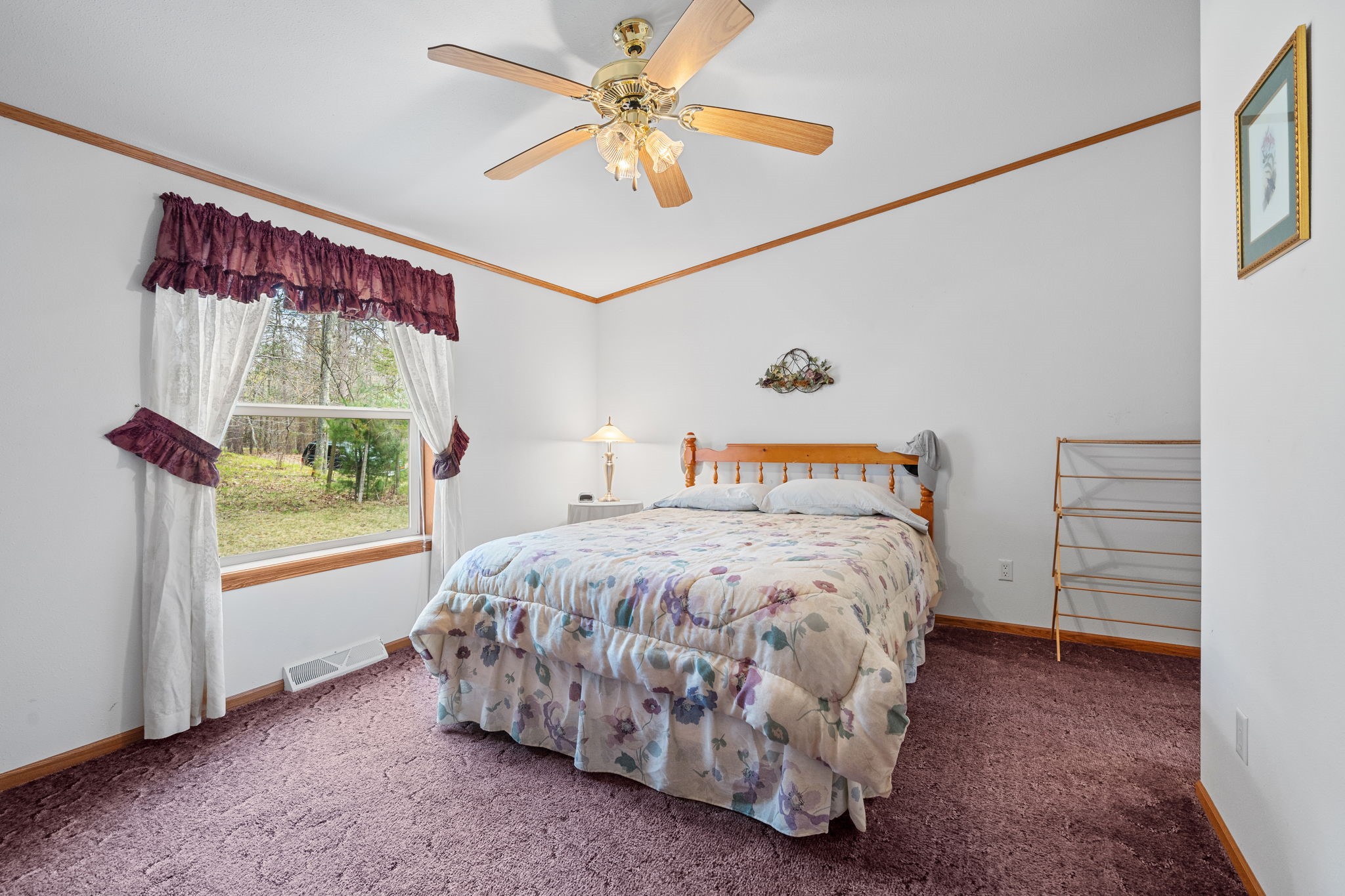 12503 Small Road Hayward, WI 54843 - Photo 29 of 36 Window of master bedroom offers private backyard views