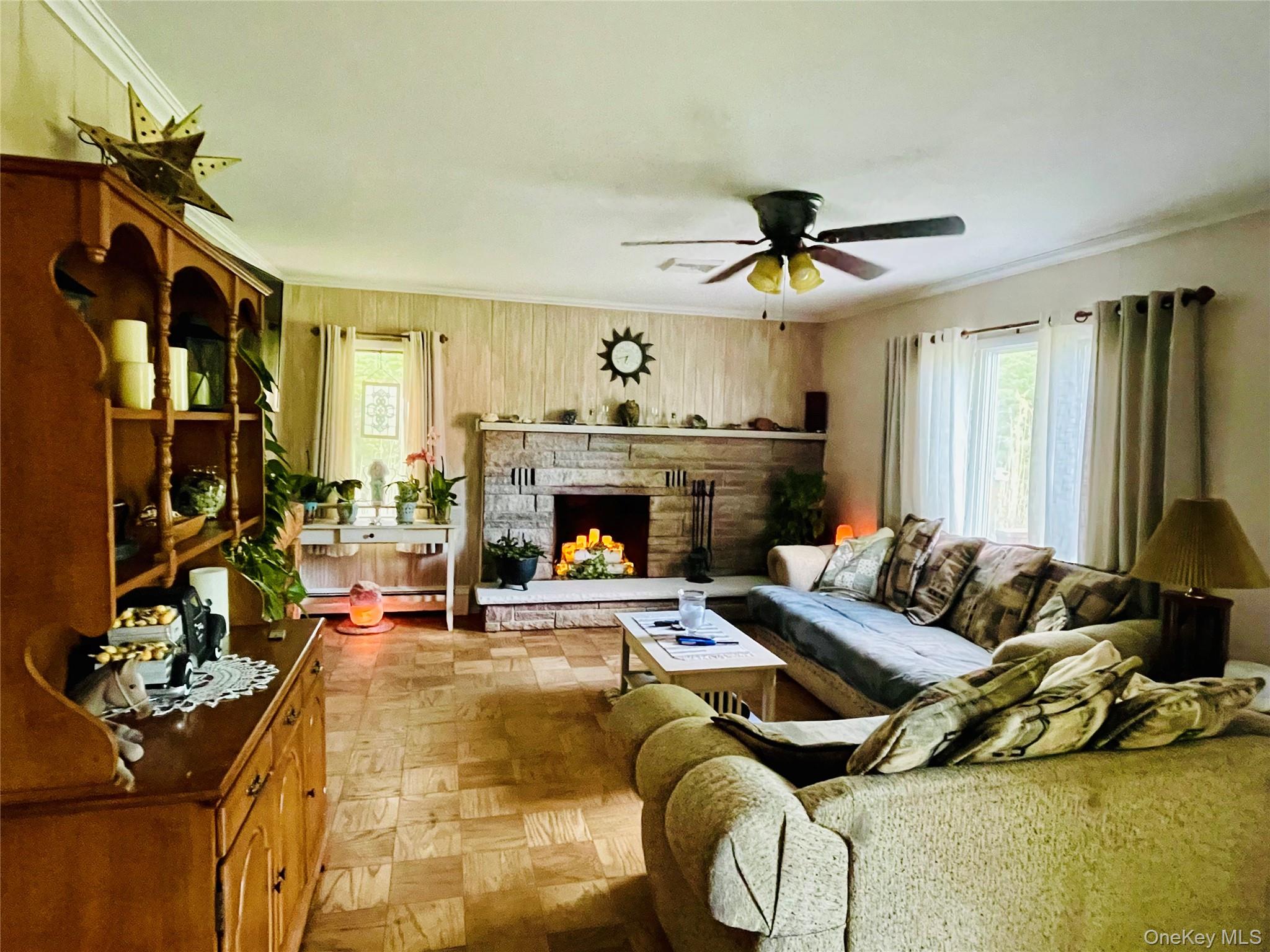 137 Cross Road Goshen, NY 10924 - Photo 13 of 50 Open concept Living Room with parquet tile flooring, fireplace.
