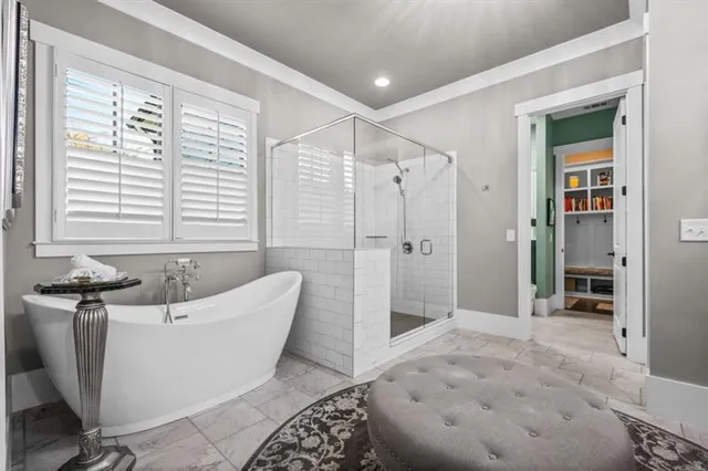 a room with a couch and a rug