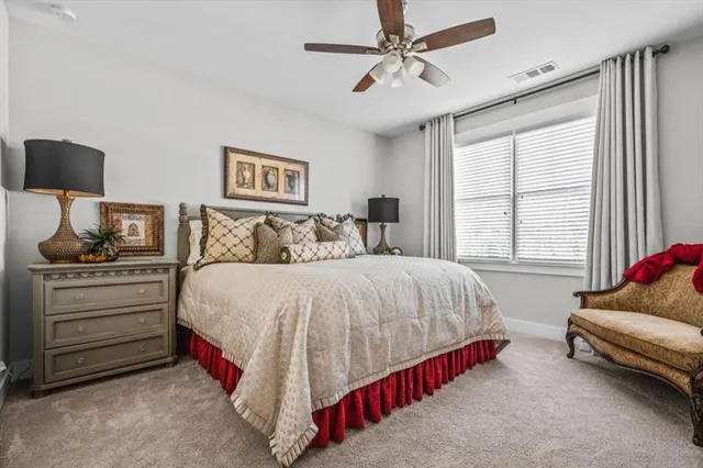 a building outdoor space with patio furniture and potted plants