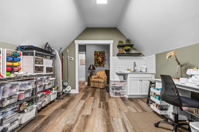 a view of a backyard with plants and flowers