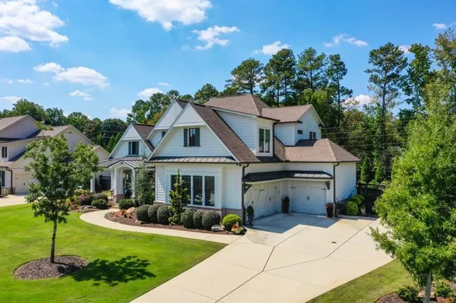 a view of a swimming pool with a yard