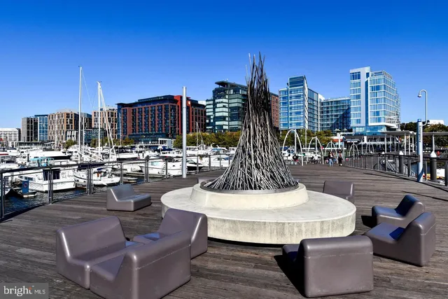 a view of a city with lawn chairs