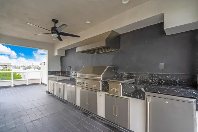 a very nice looking living room with a large window