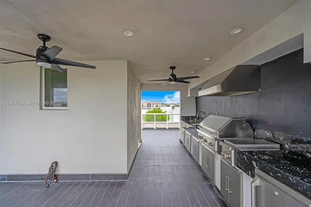 a view of building with cars parked