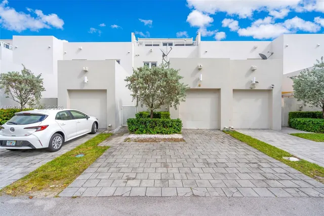 a front view of house with yard and seating area