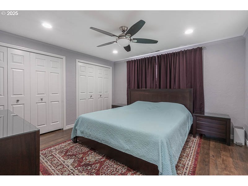 1216 Northeast Montgomery Place Albany, OR 97321 - Photo 22 of 47 a bedroom with a bed and a ceiling fan