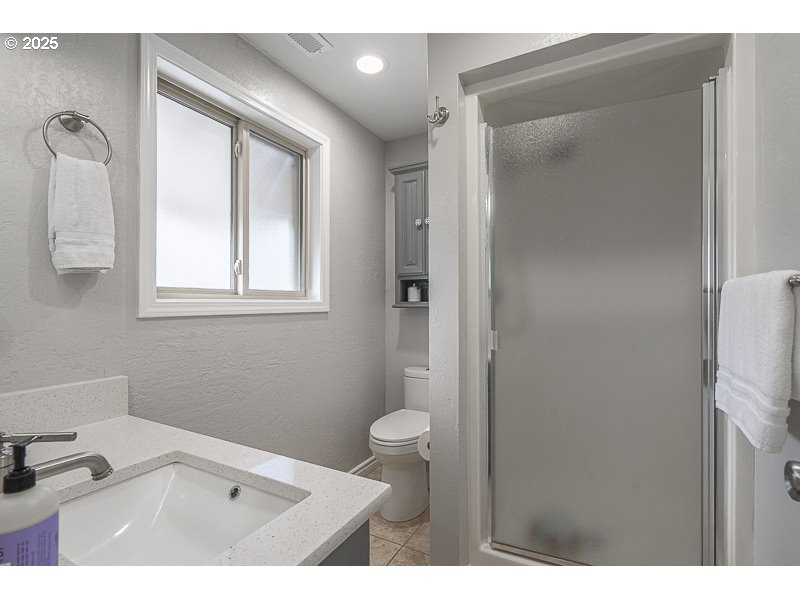 1216 Northeast Montgomery Place Albany, OR 97321 - Photo 28 of 47 a bathroom with a toilet sink and shower