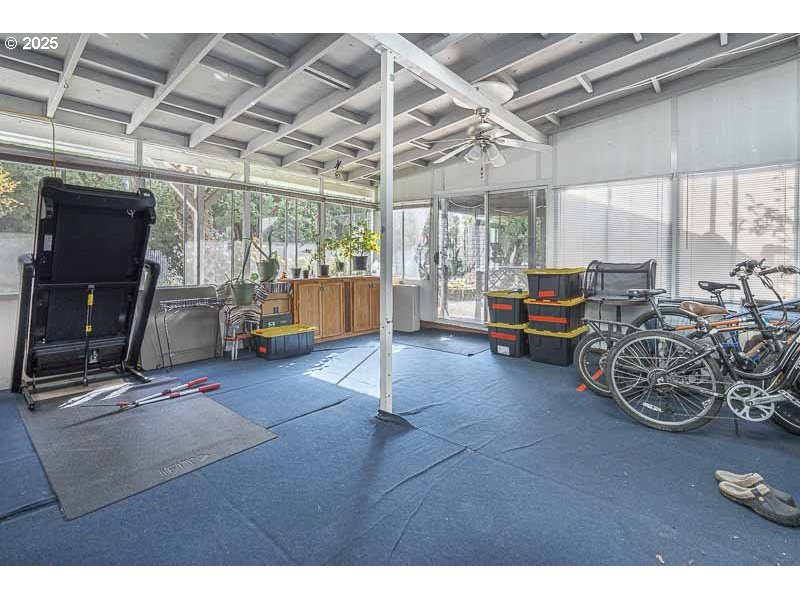 1216 Northeast Montgomery Place Albany, OR 97321 - Photo 30 of 47 a living room with furniture a flat screen tv and windows