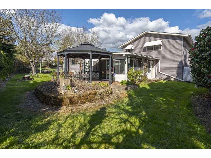 1216 Northeast Montgomery Place Albany, OR 97321 - Photo 35 of 47 a front view of a house with a yard