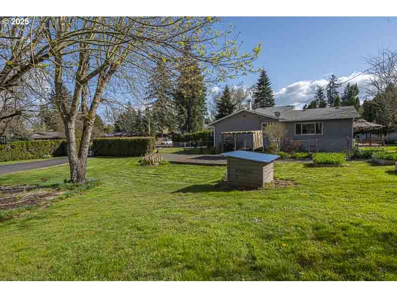 1216 Northeast Montgomery Place Albany, OR 97321 - Photo 38 of 47 a view of a house with a yard
