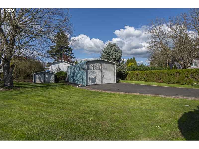 1216 Northeast Montgomery Place Albany, OR 97321 - Photo 43 of 47 a front view of a house with a garden