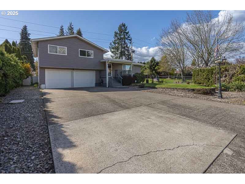 1216 Northeast Montgomery Place Albany, OR 97321 - Photo 47 of 47 a view of a house with a yard