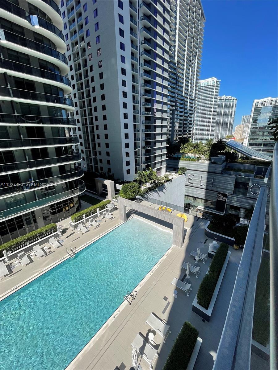 45 Southwest 9th Street, Unit 1407 Miami, FL 33130 - Photo 10 of 10 a view of a balcony with chairs
