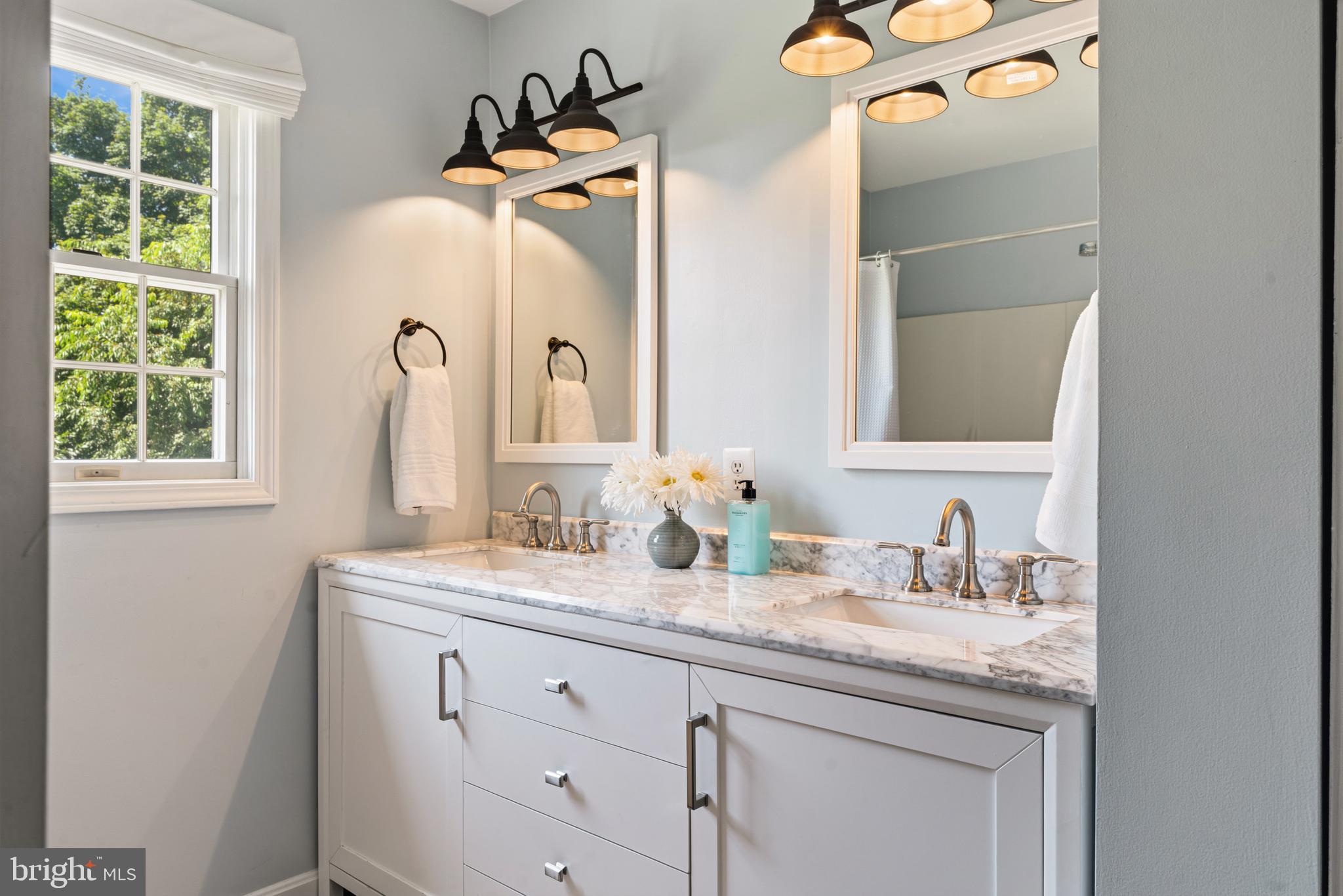 21031 Clarksburg Road Boyds, MD 20841 - Photo 32 of 79 Remodeled hall bath features double vanity