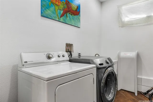 a utility room with dryer and washer
