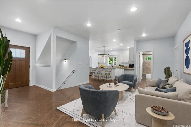 a living room with furniture and a window