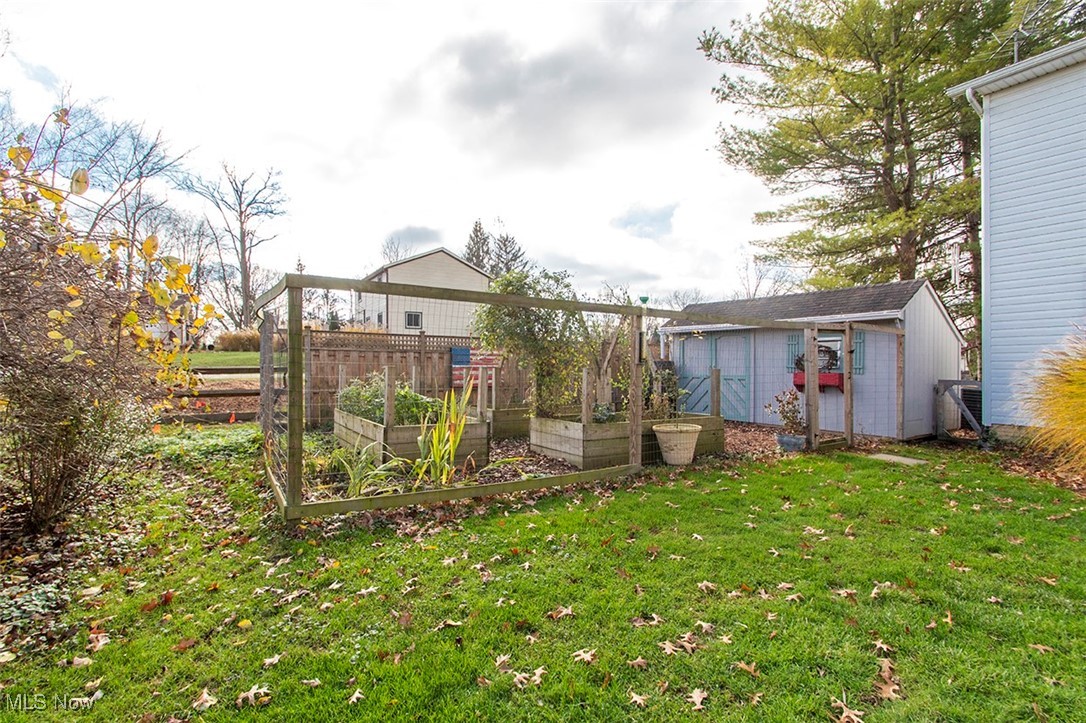4041 Huffman Road Medina, OH 44256 - Photo 34 of 40 View of yard with a storage shed