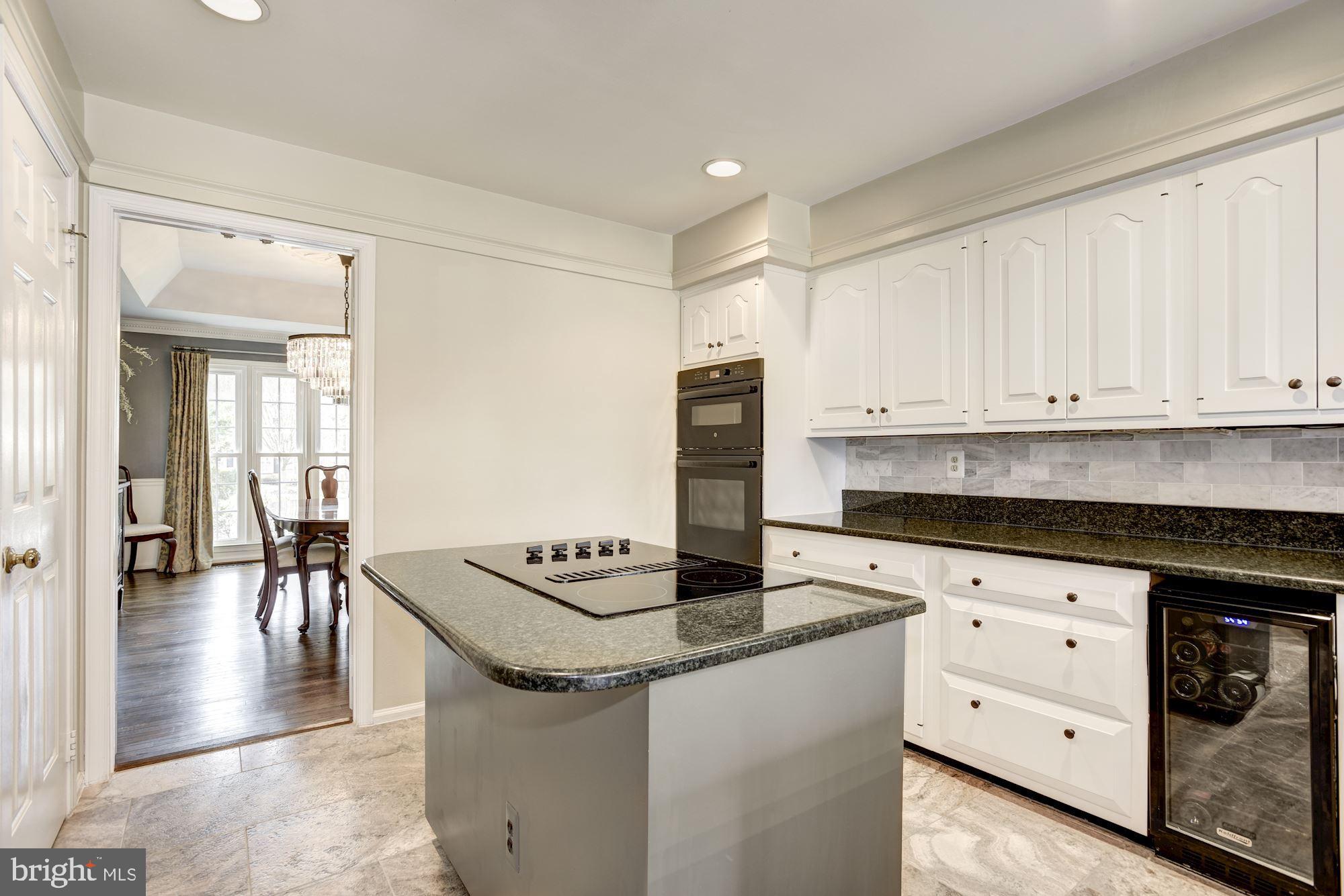 923 Ridge Drive McLean, VA 22101 - Photo 14 of 78 Under cabinet wine fridge