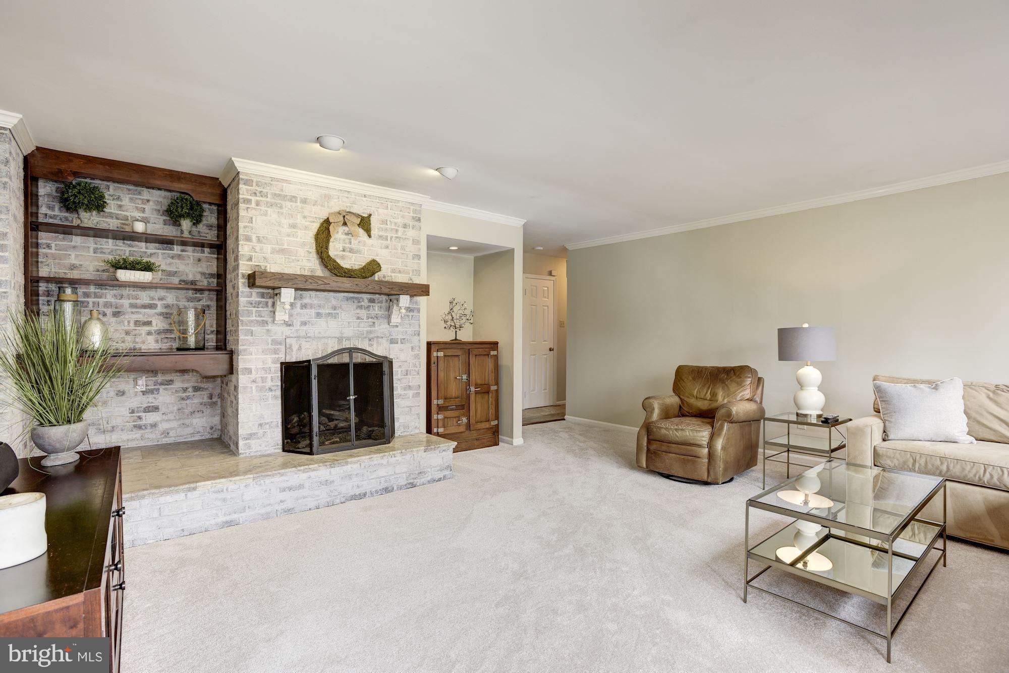 923 Ridge Drive McLean, VA 22101 - Photo 20 of 78 Gas fireplace and brick surround